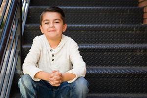 Portrait of Mixed Race Young Hispanic and Caucasian Boy photo