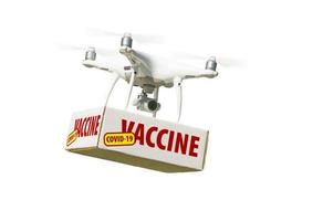 Unmanned Aircraft System Quadcopter Drone Carrying COVID-19 Vaccine Package Isolated on White photo