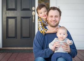 Mixed Race Father and Sons on Front Porch photo