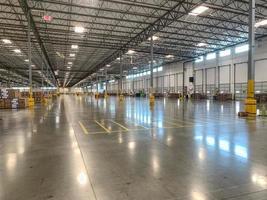 Massive Empty Industrial Warehouse Interior photo