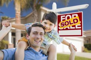 Mixed Race Father, Son Piggyback, Front of House, Sold Sign photo