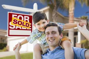 Mixed Race Father, Son Piggyback, Front of House, Sold Sign photo