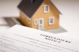 Foreclosure Notice and Model Home on Gradated Background photo