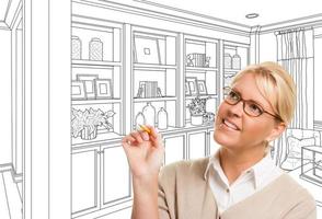 Young Woman Over Custom Built-in Shelves and Cabinets Design Drawing photo