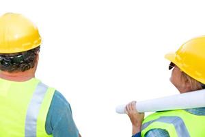 Female and Male Contractors Facing White Background Ready For Your Own Image photo