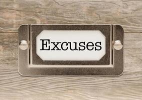 Excuses Metal File Cabinet Label Frame on Wood photo