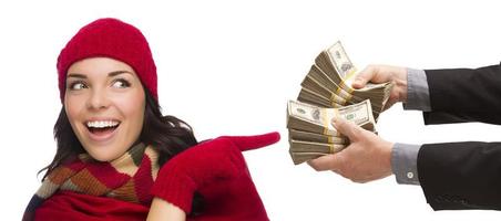 Mixed Race Young Woman Being Handed Thousands of Dollars photo