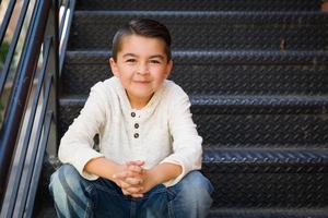 Portrait of Mixed Race Young Hispanic and Caucasian Boy photo