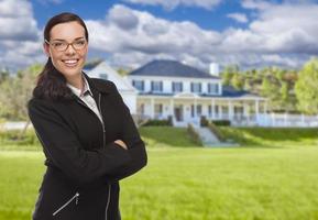 Mixed Race Woman in Front of Residential House photo