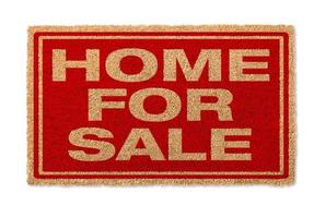 Home For Sale Welcome Mat Isolated On A White Background with Clipping Path photo