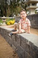 Young Chinese and Caucasian Boy Having Fun at the Park. photo