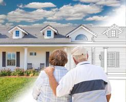 Senior Couple Looking At New House Drawing Gradating Into Photograph. photo