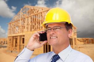 Contractor in Hardhat at Construction Site photo