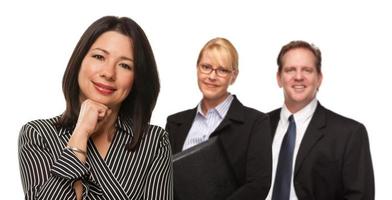 Hispanic Woman In Front of Businesspeople on White photo