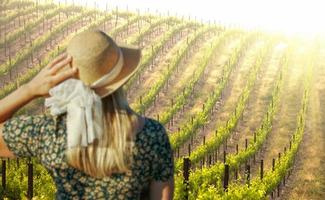 Beautiful Woman Strolling at a Winery photo