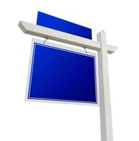 signo de bienes raíces azul en blanco sobre blanco foto