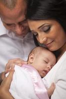 Mixed Race Young Family with Newborn Baby photo