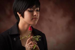 Pretty Multiethnic Young Adult Woman Portrait with Rose photo