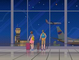 Passengers in the night terminal of the airport look through the window at the planes. Vector. vector