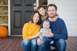 Young Mixed Race Chinese and Caucasian Family Portrait photo