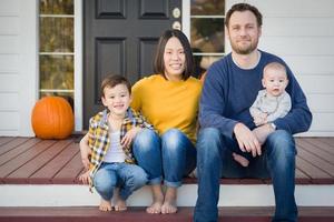 Young Mixed Race Chinese and Caucasian Family Portrait photo