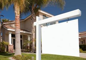 Blank Real Estate Sign and Home photo