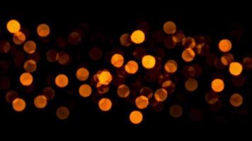 Loop glow orange bokeh particles animation abstract background video
