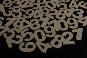 Background of numbers. from zero to nine. Numbers texture. Finance data concept. Mathematic. Seamless pattern with numbers. financial crisis concept. Business success. photo