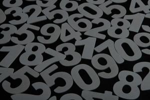 Background of numbers. from zero to nine. Numbers texture. Finance data concept. Mathematic. Seamless pattern with numbers. financial crisis concept. Business success. photo