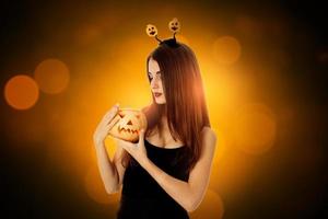 woman in halloween style clothes photo