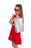 Woman is holding a shopping bag photo