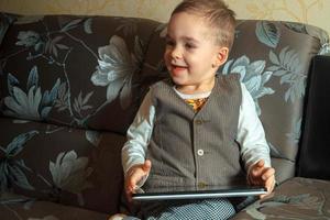 happy boy in elegance suit photo