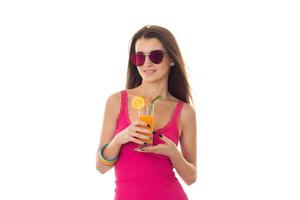 Summer portrait of young cheerful girl with cockatil in sunglasses isolated on white background photo