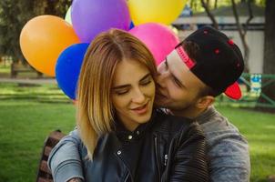 couple in love outdoors kissing photo