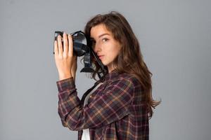 pretty young girl testing virtual reality glasses photo