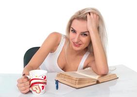 Woman with cup and book photo