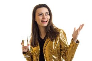 Funny glamour woman in golden jacket with glass of wine photo