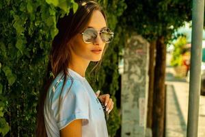 portrait of beautiful girl in a tropics photo