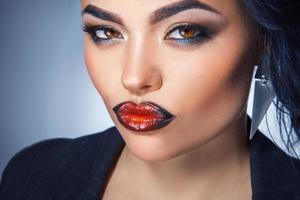 Portrait of beautiful woman with make up in studio photo