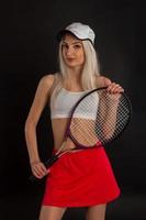 Tennis player with racket photo