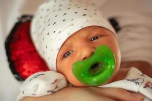 Portrait of a cute newborn girl photo