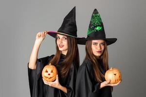 young girls in halloween style clothes photo