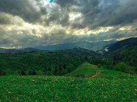 mountain and the sun rays photo