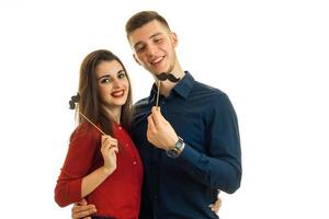 cheerful young couple having fun with a sham photo