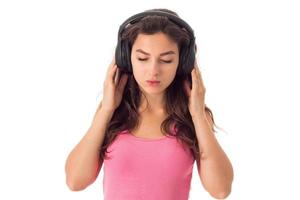 girl in headphones in studio photo