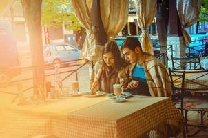 loving couple having dinner in a restaurant photo