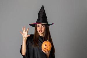 young woman in halloween style clothes photo