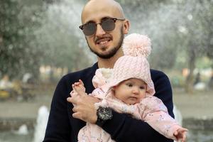 happy father with his little baby girl photo