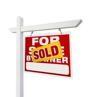 House sale sign post - sold photo