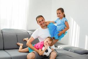 little girls with soccer ball at home photo